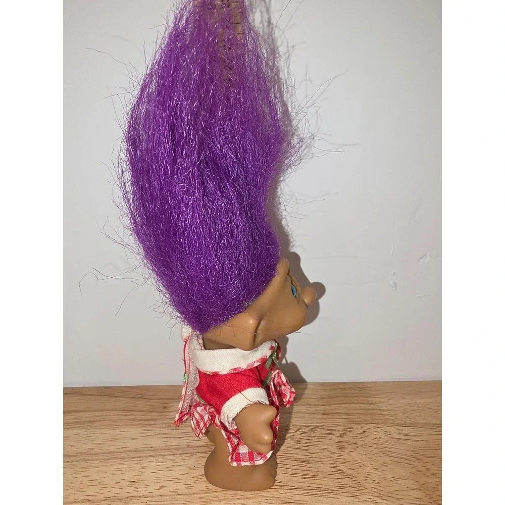vintage Ace Novelty Treasure Troll doll featuring purple hair, blue eyes